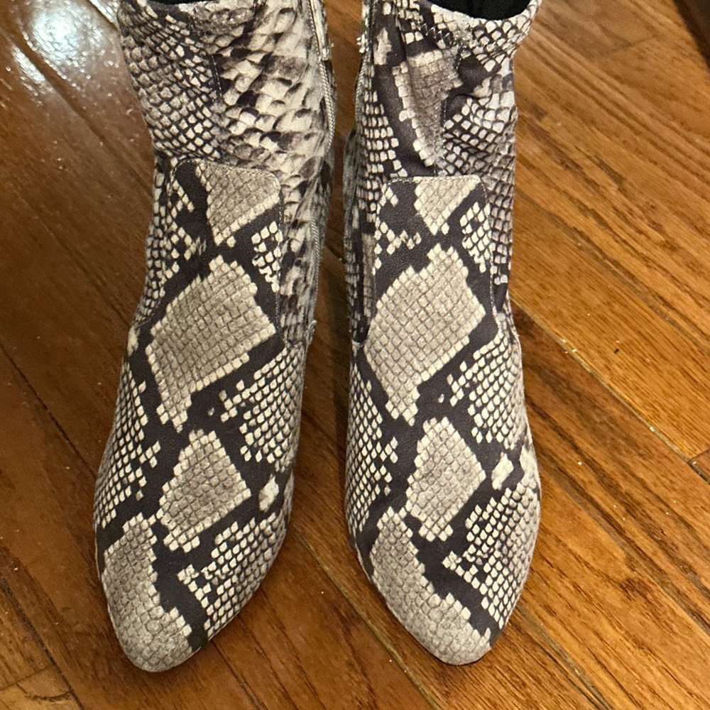 Steve Madden Elory Snake Skin Printed
Fabric Booties
